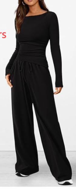Black jumpsuit worn by a model on a white background