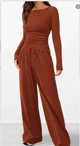 Brown long-sleeve jumpsuit on a white background