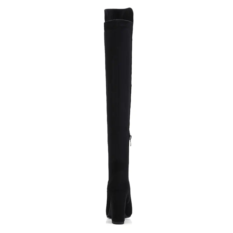 Black knee-high boot on a white background