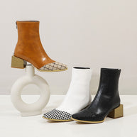 Three pairs of ankle boots in brown, white, and black on a light gray background.