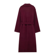 Maroon coat on a white background