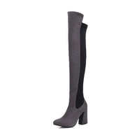 Gray knee-high boot on a white background